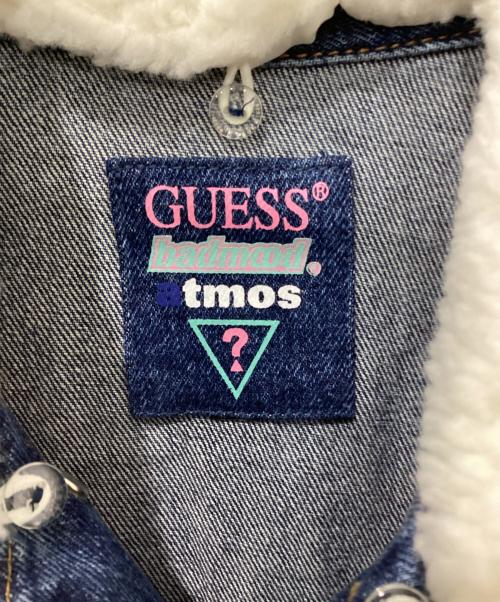 GUESS（ゲス）GUESS (ゲス) atmos (アトモス) BADMOOD (バッドムード) デニムジャケット インディゴ サイズ:M 未使用品の古着・服飾アイテム