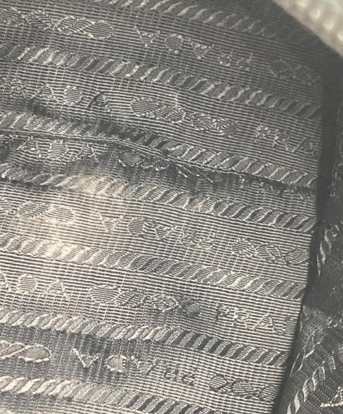 PRADA（プラダ）PRADA (プラダ) メタルパーツ付きナイロンポーチ ブラックの古着・服飾アイテム