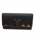 LOUIS VUITTON（ルイ ヴィトン）の古着「ポルトフォイユ・カプシーヌ」｜ブラック