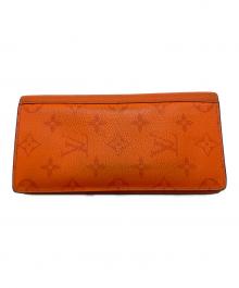LOUIS VUITTON（ルイ ヴィトン）の古着「長財布」｜オレンジ