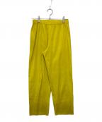 me ISSEY MIYAKEミーイッセイ ミヤケ）の古着「プリーツパンツ」｜イエロー