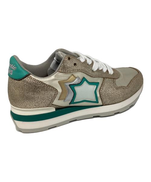 atlantic stars（アトランティックスターズ）atlantic stars (アトランティックスターズ) ローカットスニーカー シャンパンゴールド×グリーン サイズ:36の古着・服飾アイテム