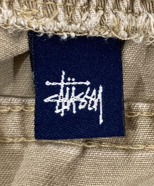 stussy（ステューシー）stussy (ステューシー) サイドラインハーフパンツ/OLDSTUSSY/紺タグ ベージュ サイズ:Mの古着・服飾アイテム