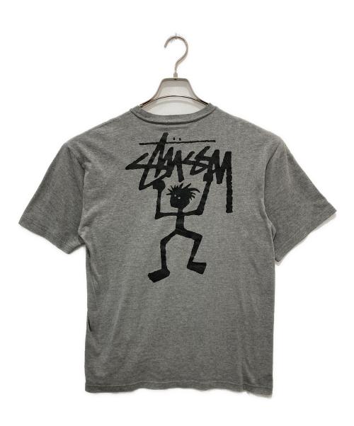 stussy（ステューシー）stussy (ステューシー) シャドーマンTシャツ/USA製/紺タグ/OLDSTUSSY グレー サイズ:Mの古着・服飾アイテム