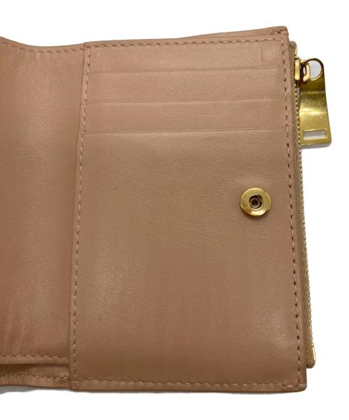 BOTTEGA VENETA（ボッテガベネタ）BOTTEGA VENETA (ボッテガベネタ) NAPPA イントレチャート二つ折り財布 ベージュの古着・服飾アイテム