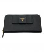 PRADAプラダ）の古着「サフィアーノ リボン ラウンドジップ ロングウォレット」｜ブラック
