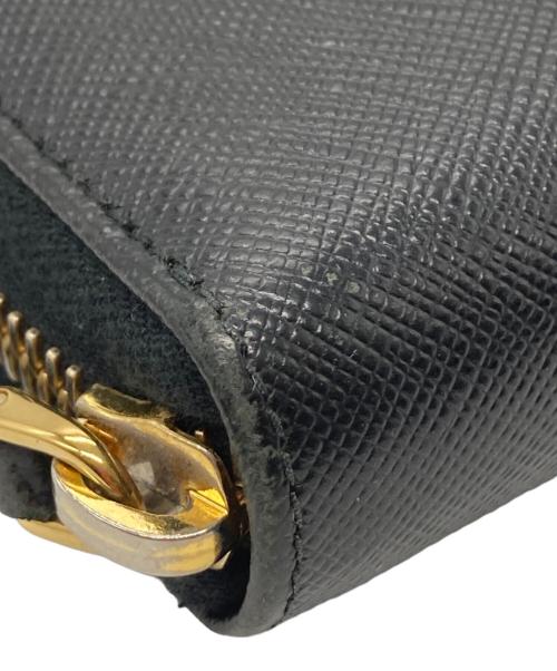 PRADA（プラダ）PRADA (プラダ) サフィアーノ リボン ラウンドジップ ロングウォレット ブラックの古着・服飾アイテム