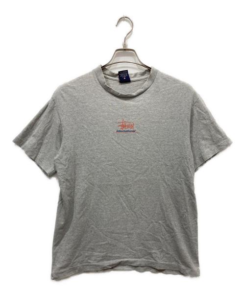 stussy（ステューシー）stussy (ステューシー) INTERNATIONAL LOGO T グレー サイズ:Mの古着・服飾アイテム