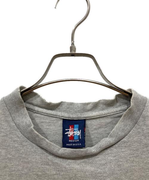 stussy（ステューシー）stussy (ステューシー) INTERNATIONAL LOGO T グレー サイズ:Mの古着・服飾アイテム