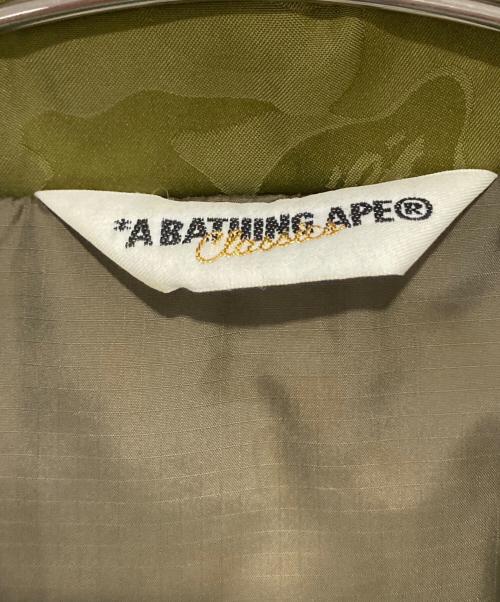 A BATHING APE（ア ベイシング エイプ）A BATHING APE (ア ベイシング エイプ) M-43カモ柄ダウンジャケット カーキ サイズ:Sの古着・服飾アイテム
