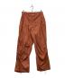 US ARMY（ユーエスアーミー）の古着「後染スノーカモパンツ」｜オレンジ