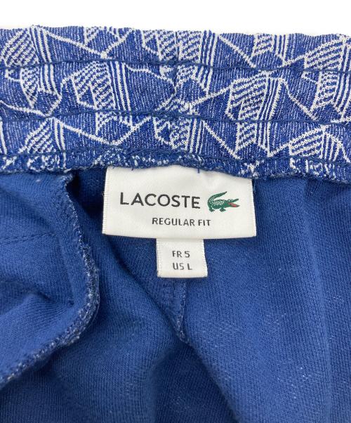 LACOSTE（ラコステ）LACOSTE (ラコステ) サイドテーピングモノグラムジャカードトラックパンツ ブルー サイズ:Lの古着・服飾アイテム