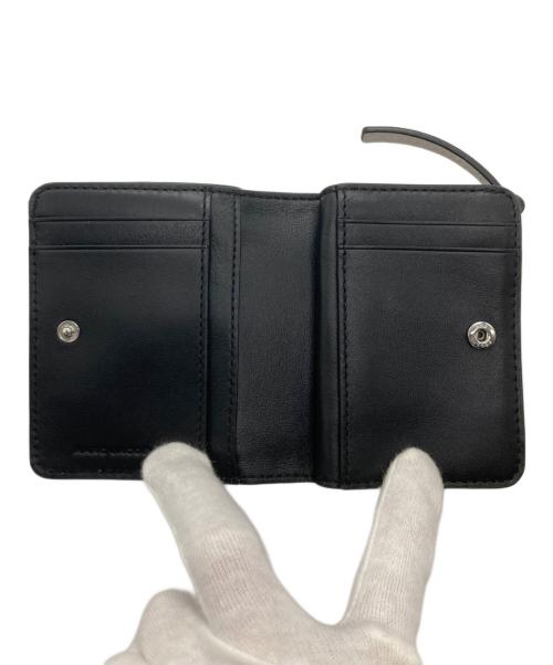 MARC JACOBS（マークジェイコブズ）MARC JACOBS (マークジェイコブズ) PEANUTS (ピーナッツ) 2つ折り財布 ホワイトの古着・服飾アイテム