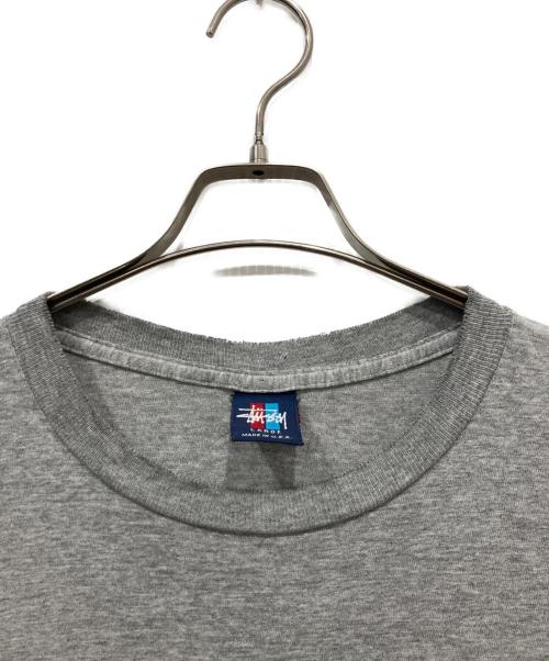 stussy（ステューシー）stussy (ステューシー) シャドーマンゴルフ プリントTシャツ グレー サイズ:Lの古着・服飾アイテム