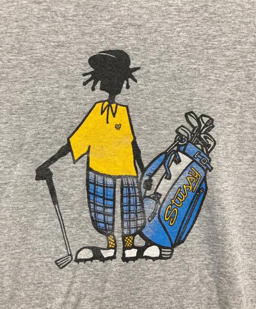 stussy（ステューシー）stussy (ステューシー) シャドーマンゴルフ プリントTシャツ グレー サイズ:Lの古着・服飾アイテム