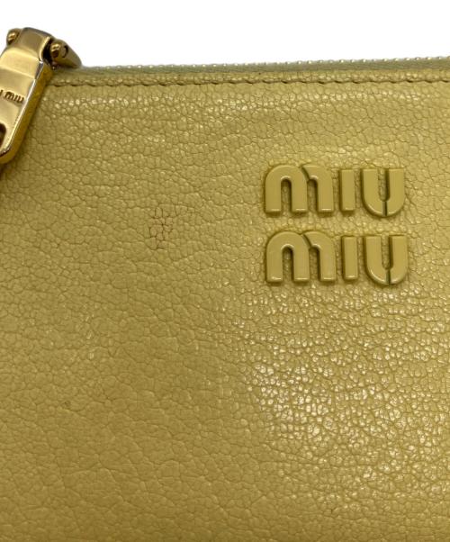 MIU MIU（ミュウミュウ）MIU MIU (ミュウミュウ) マドラス フラグメントケース イエローの古着・服飾アイテム
