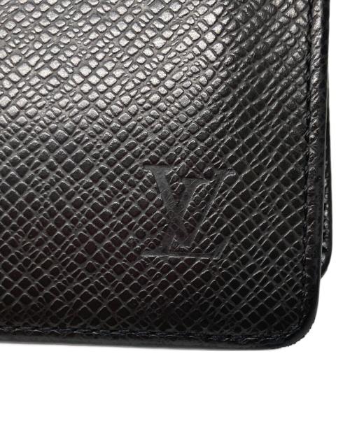 LOUIS VUITTON（ルイ ヴィトン）LOUIS VUITTON (ルイ ヴィトン) タイガ ポルト ビエ・3 ヴォレ 2つ折り財布 ブラックの古着・服飾アイテム