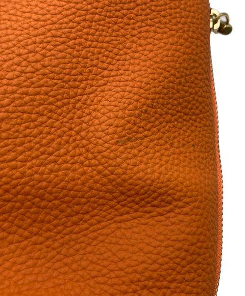 Magnu（マヌー）Magnu (マヌー) レザーハンドバッグ オレンジの古着・服飾アイテム