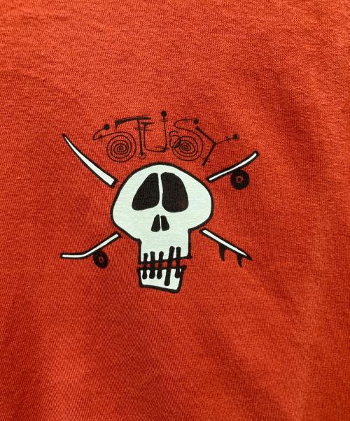 stussy（ステューシー）stussy (ステューシー) SURF SKATE SKULL TEE オレンジ サイズ:Lの古着・服飾アイテム