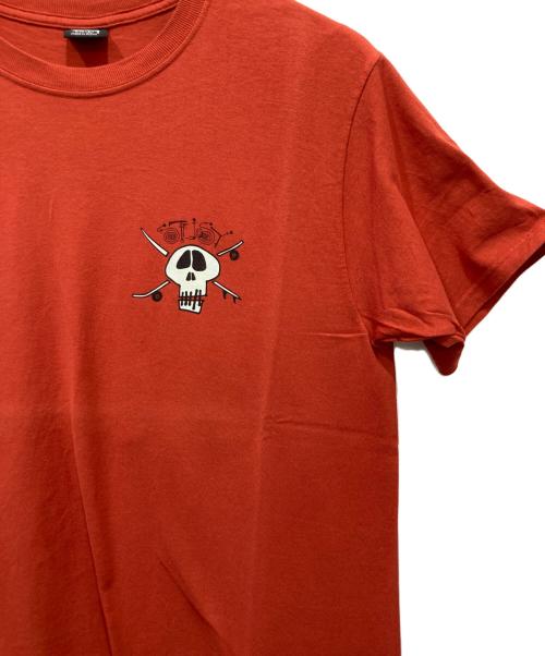stussy（ステューシー）stussy (ステューシー) SURF SKATE SKULL TEE オレンジ サイズ:Lの古着・服飾アイテム