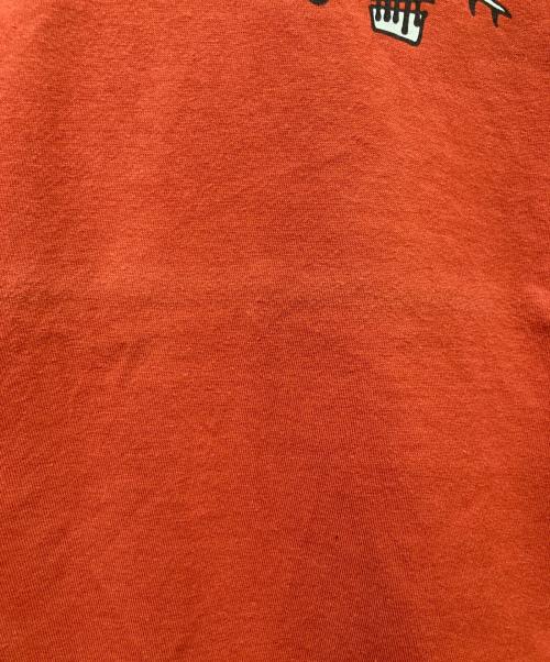 stussy（ステューシー）stussy (ステューシー) SURF SKATE SKULL TEE オレンジ サイズ:Lの古着・服飾アイテム