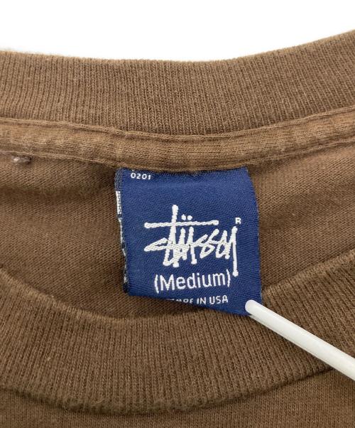 stussy（ステューシー）stussy (ステューシー) プリントTシャツ ブラウン サイズ:Mの古着・服飾アイテム