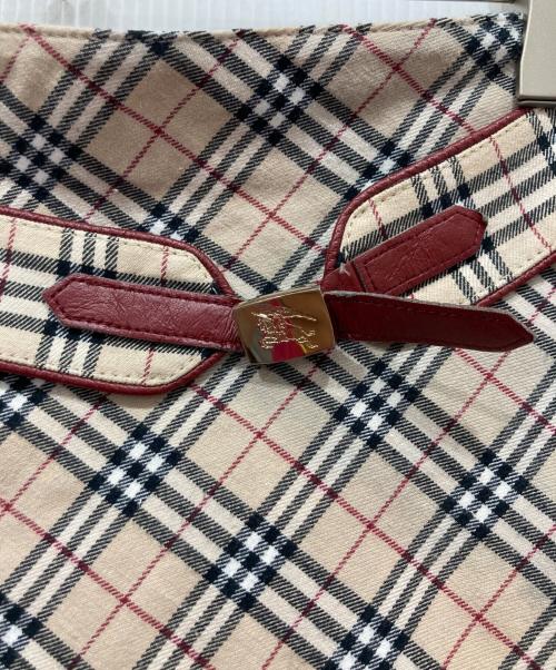 BURBERRY BLUE LABEL（バーバリー ブルー レーベル）BURBERRY BLUE LABEL (バーバリー ブルー レーベル) ベルト付きノバチェックスカート ベージュ×レッド サイズ:38の古着・服飾アイテム