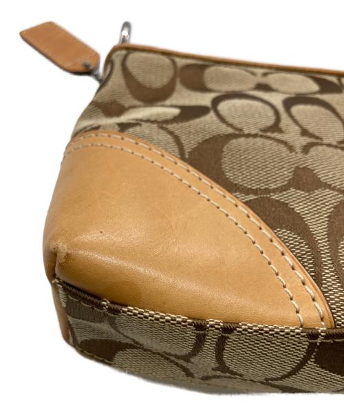 COACH（コーチ）COACH (コーチ) アクセサリーポーチ ブラウンの古着・服飾アイテム