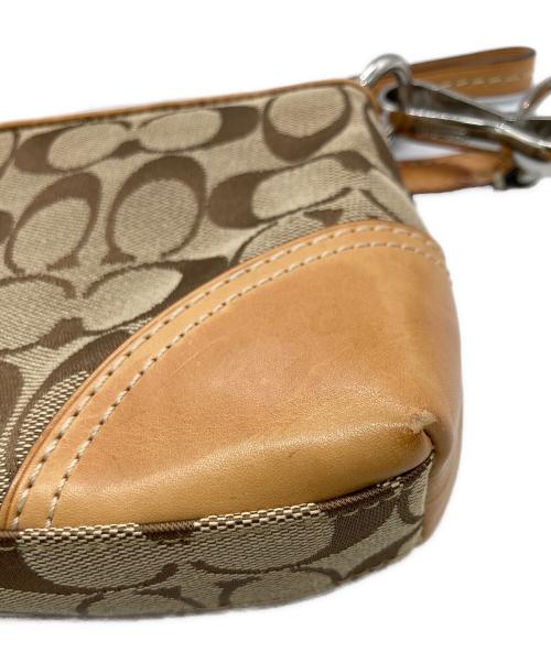COACH（コーチ）COACH (コーチ) アクセサリーポーチ ブラウンの古着・服飾アイテム