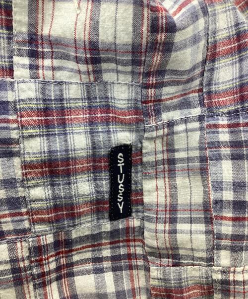 stussy（ステューシー）stussy (ステューシー) パッチワークシャツ ブルー×レッド サイズ:Sの古着・服飾アイテム
