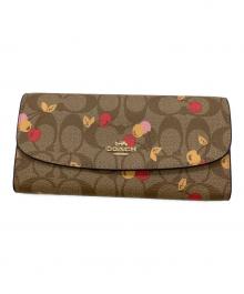 COACH（コーチ）の古着「SLIMENVELOPEWALLET CHERRYPRINT」｜ブラウン