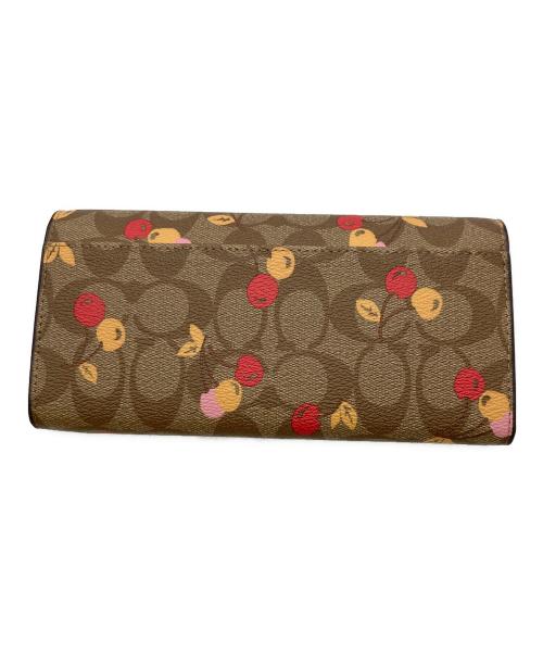 COACH（コーチ）COACH (コーチ) SLIMENVELOPEWALLET CHERRYPRINT ブラウンの古着・服飾アイテム