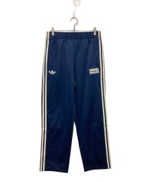 adidas Originals（アディダスオリジナル）の古着「Oasis ツアー ファイヤーバード トラックパンツ」｜ブルー