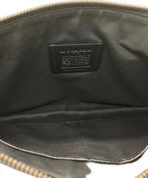 COACH（コーチ）COACH (コーチ) シグネチャーエンボスドクラッチバッグ ブラックの古着・服飾アイテム
