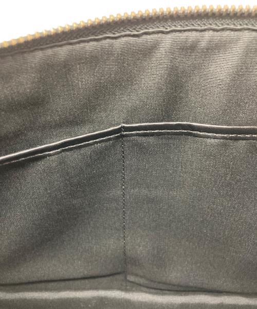 COACH（コーチ）COACH (コーチ) シグネチャーエンボスドクラッチバッグ ブラックの古着・服飾アイテム