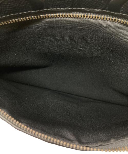 COACH（コーチ）COACH (コーチ) シグネチャーエンボスドクラッチバッグ ブラックの古着・服飾アイテム
