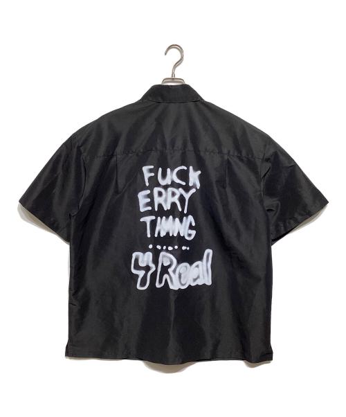 HERON PRESTON（ヘロンプレストン）HERON PRESTON (ヘロンプレストン) スローガン プリント ショートスリーブ シャツ ブラック サイズ:Mの古着・服飾アイテム