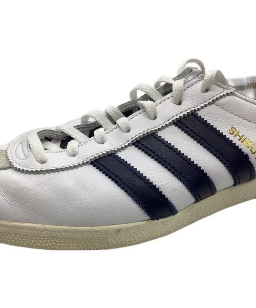 adidas（アディダス）adidas (アディダス) SHIBUYA IH1306 ローカットスニーカー ホワイト×ネイビー サイズ:US8.5の古着・服飾アイテム