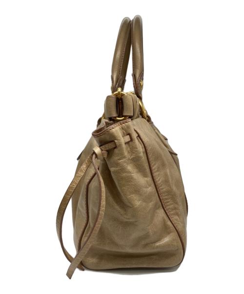 MIU MIU（ミュウミュウ）MIU MIU (ミュウミュウ) ヴィッテロリュクス レザー 2WAYバッグ ベージュの古着・服飾アイテム