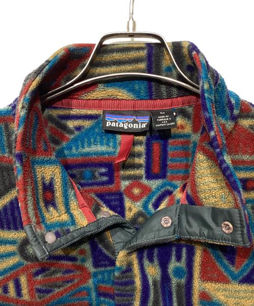 Patagonia（パタゴニア）Patagonia (パタゴニア) 90’S 　アボリジニ柄 シンチラスナップTジャケット マルチカラー サイズ:Mの古着・服飾アイテム