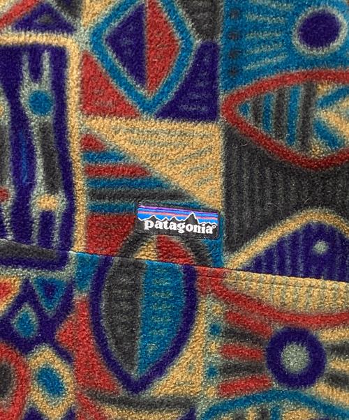 Patagonia（パタゴニア）Patagonia (パタゴニア) 90’S 　アボリジニ柄 シンチラスナップTジャケット マルチカラー サイズ:Mの古着・服飾アイテム
