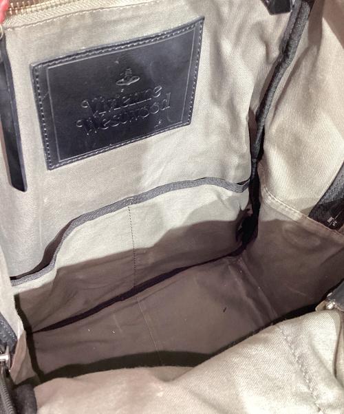 Vivienne Westwood（ヴィヴィアンウエストウッド）Vivienne Westwood (ヴィヴィアンウエストウッド) PVCオーブ柄リュック ブラック×レッドの古着・服飾アイテム
