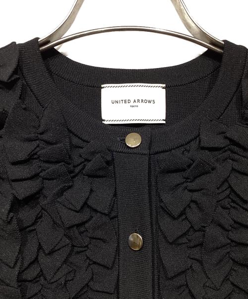 UNITED ARROWS TOKYO（ユナイテッドアローズトウキョウ）UNITED ARROWS TOKYO (ユナイテッドアローズトウキョウ) ミニフリル ニットカーディガン ブラック サイズ:-の古着・服飾アイテム