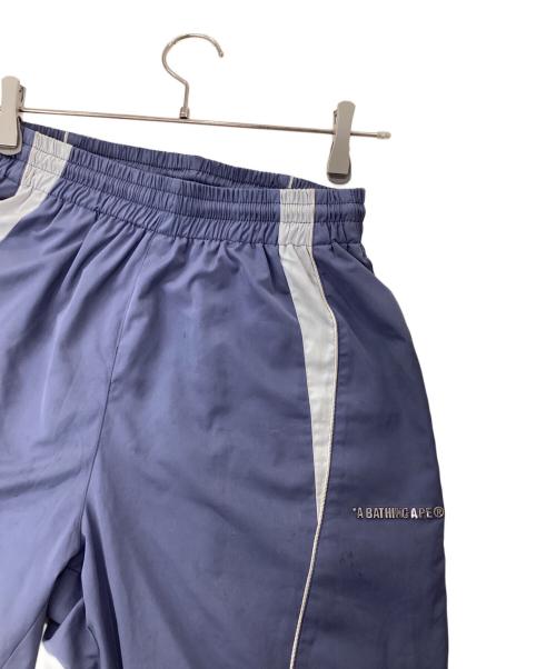 A BATHING APE（ア ベイシング エイプ）A BATHING APE (ア ベイシング エイプ) LOGO NYLON TRACK PANTS ネイビー サイズ:Sの古着・服飾アイテム