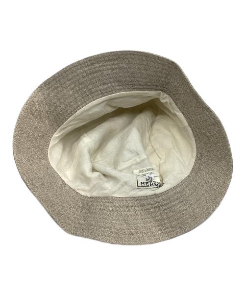 HERMES（エルメス）HERMES (エルメス) サイドジップリネンバケットハット ベージュの古着・服飾アイテム