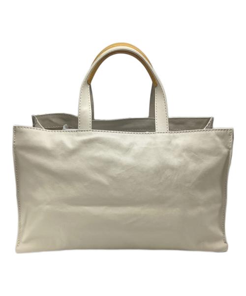 russet（ラシット）russet (ラシット) Cat’s ISSUE 横長ハンドバッグ ベージュの古着・服飾アイテム