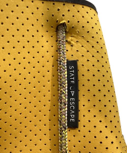 STATE OF ESCAPE（ステイトオブエスケープ）STATE OF ESCAPE (ステイトオブエスケープ) ESCAPE CARRYALLトートバッグ イエローの古着・服飾アイテム