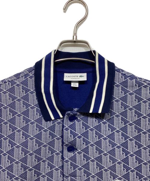 LACOSTE（ラコステ）LACOSTE (ラコステ) モノグラムジャカードポロシャツ ブルー サイズ:US Mの古着・服飾アイテム