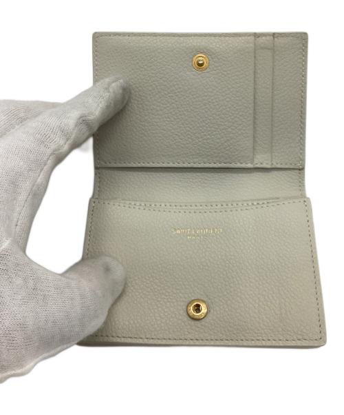 Saint Laurent Paris（サンローランパリ）Saint Laurent Paris (サンローランパリ) YSLラインレザーカードケース613536 ベージュの古着・服飾アイテム