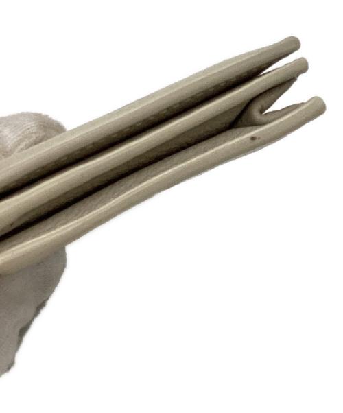 Saint Laurent Paris（サンローランパリ）Saint Laurent Paris (サンローランパリ) YSLラインレザーカードケース613536 ベージュの古着・服飾アイテム